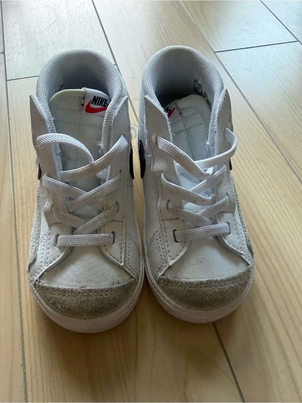 Nike Kids White High-Top Sneakers with Black Swoosh Accent